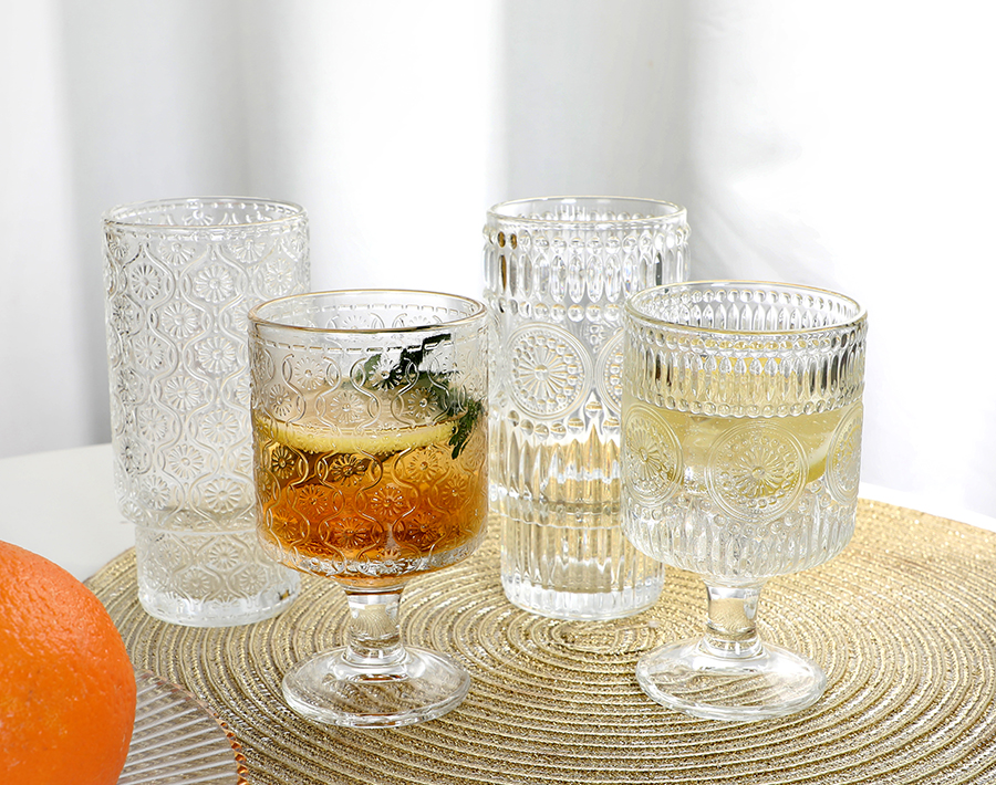 New trends footed glass cup with classic engraved design goblet