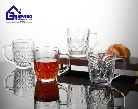 Factory cheap hot sale embossed tea glass mug with engraved design for home use