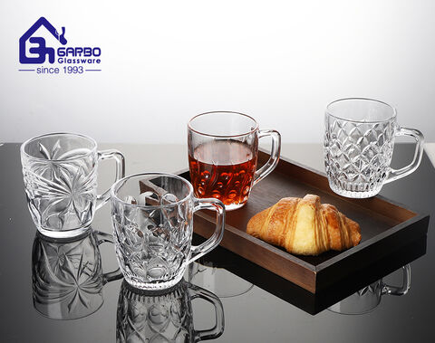 Factory cheap hot sale embossed tea glass mug with engraved design for home use