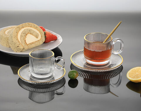 Mouth gold rim tea mug saucer set with ribbed design